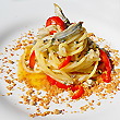 Spaghetto mantecato all’aguglia, papaccella e cous cous di pan grattato alla colatura di alici